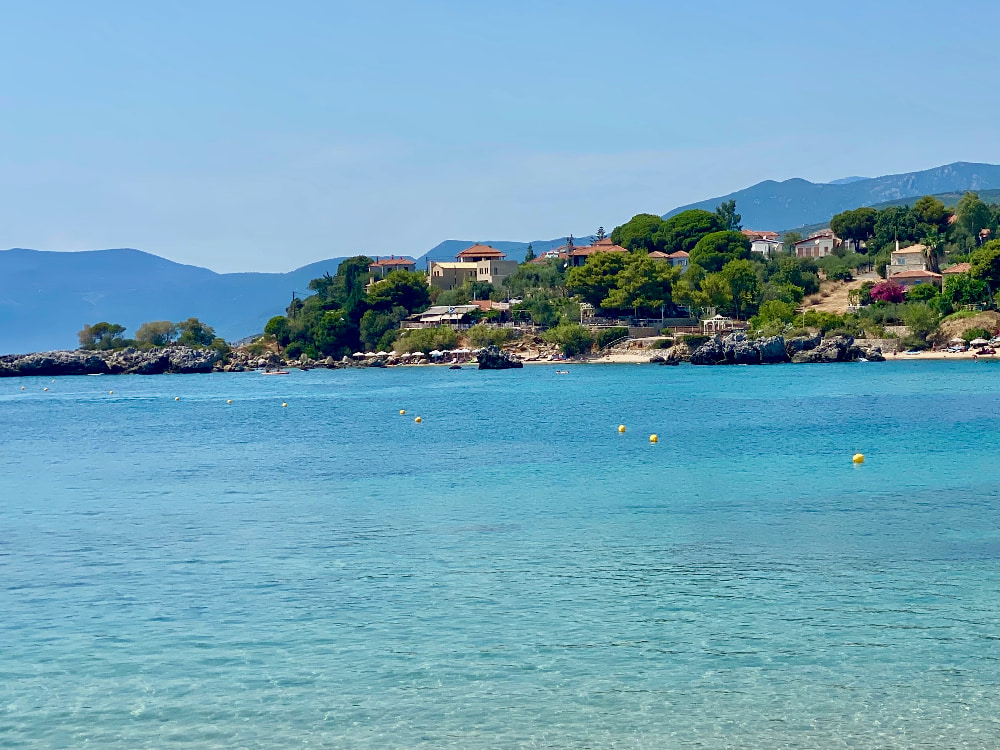 Kalogria Beach in Mani: Crystal-clear waters and golden sands.